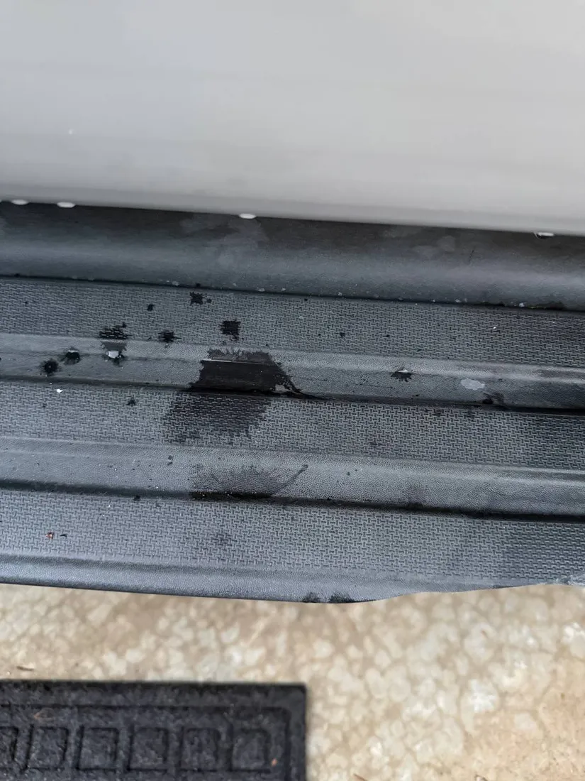 Running board with dirt and stains before cleaning